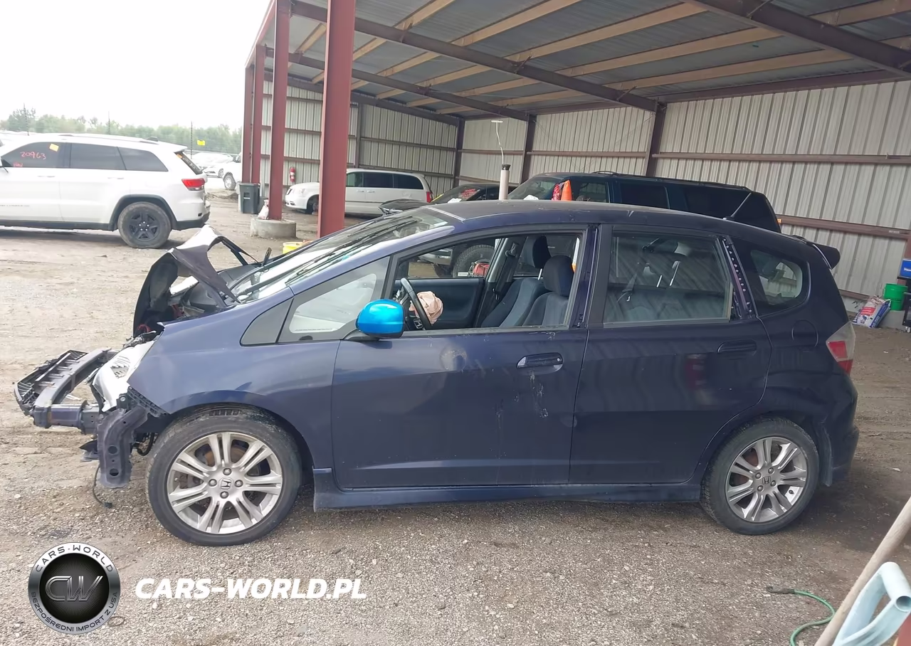 2009 Honda Fit Sport VIN:JHMGE88429S035810 - 14