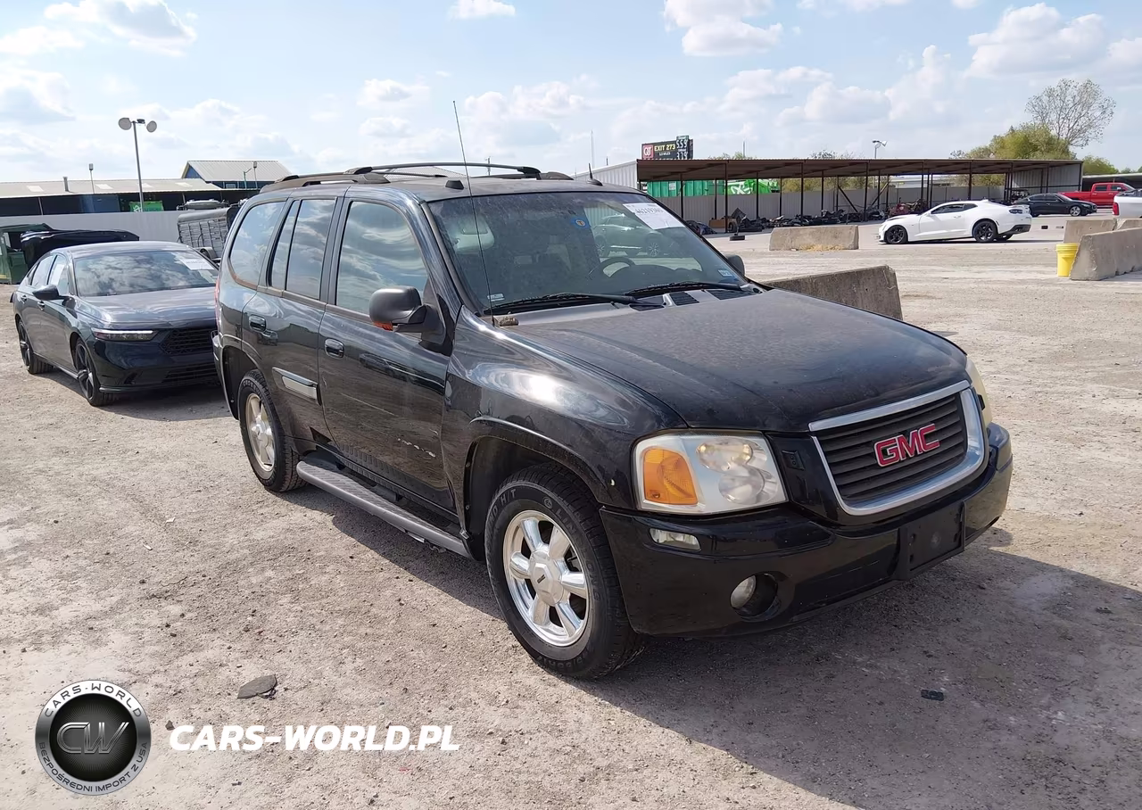 2005 GMC Envoy Slt VIN:1GKDS13S552371654 - 1