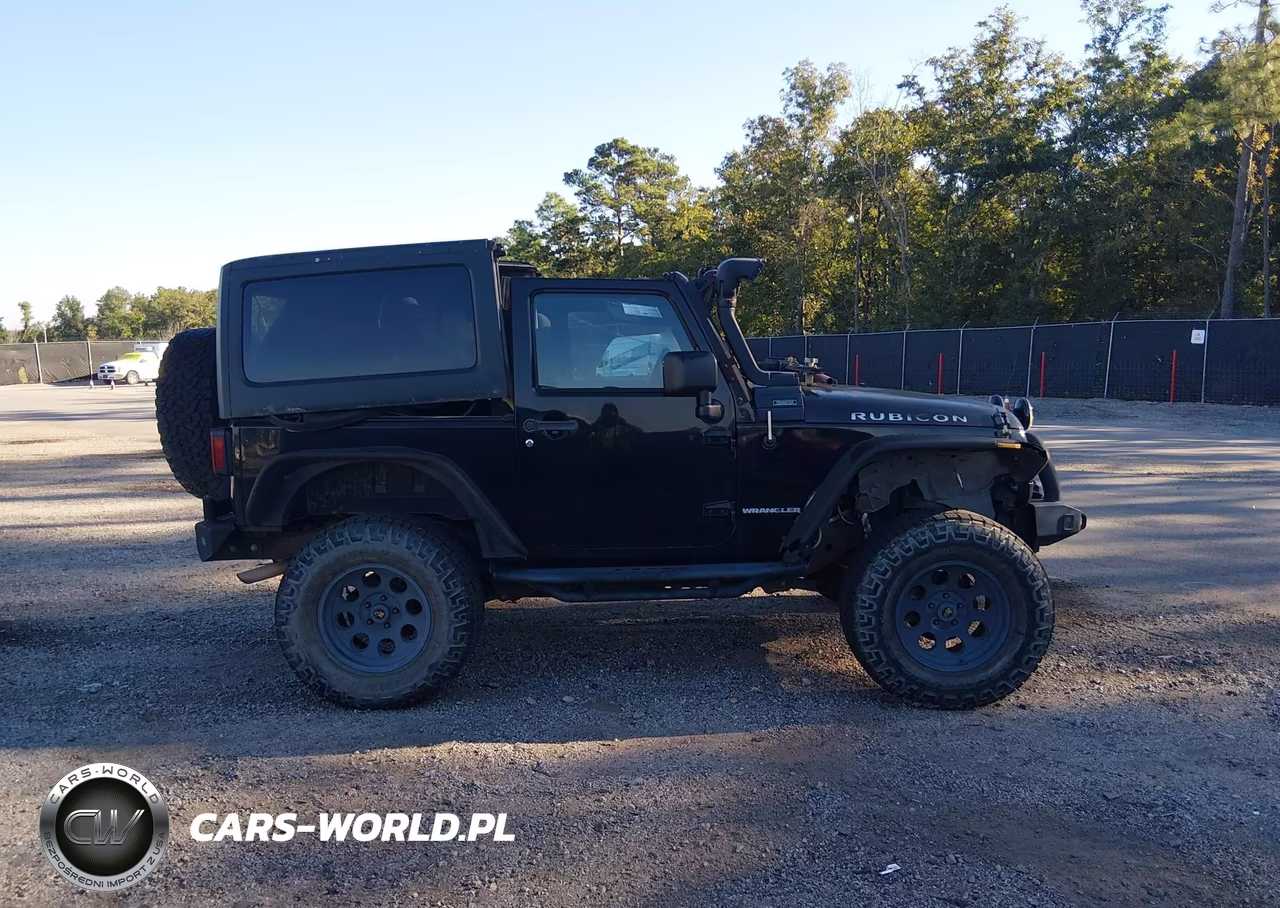 2013 Jeep Wrangler Rubicon VIN:1C4HJWCG5DL517018 - 13
