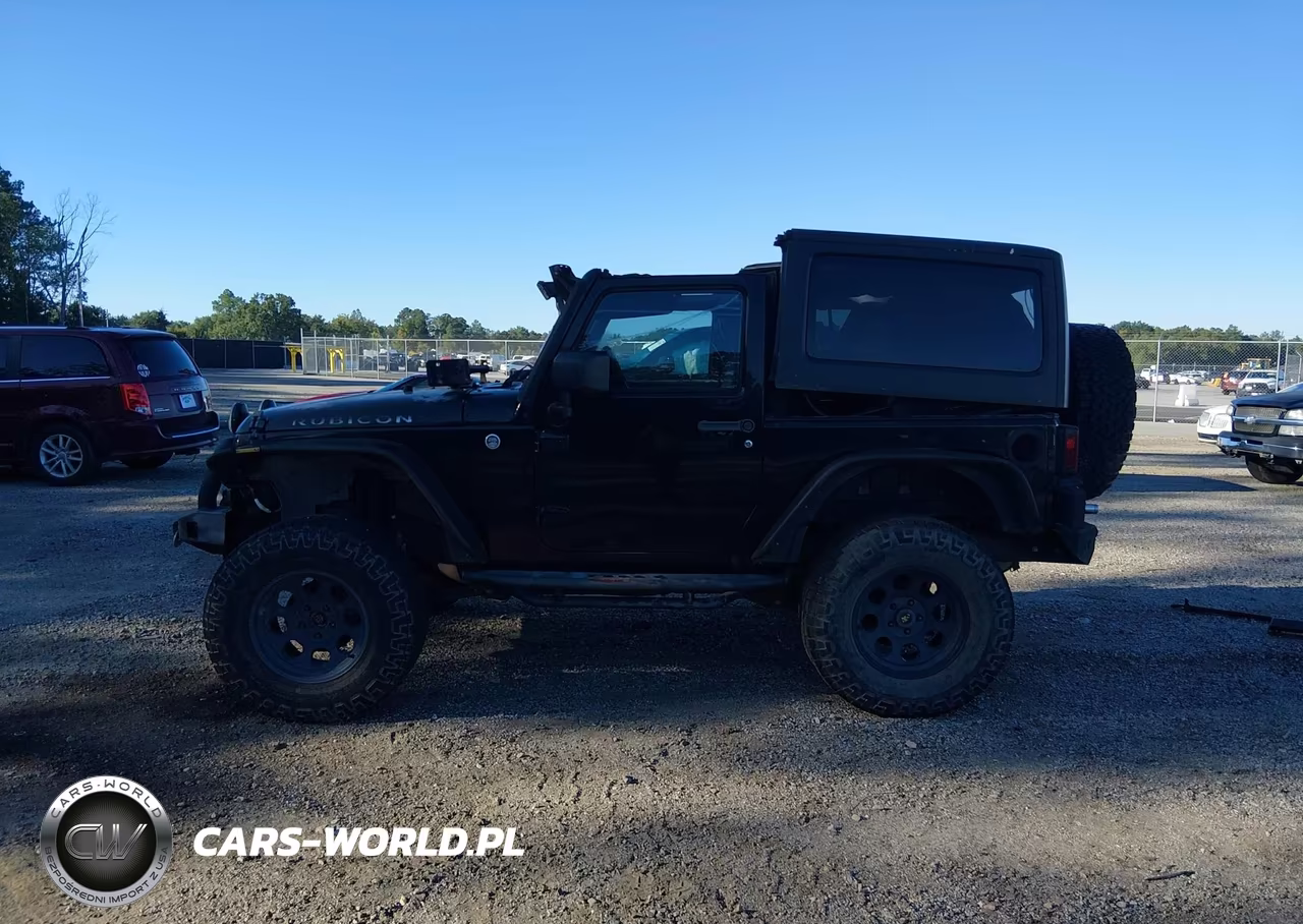 2013 Jeep Wrangler Rubicon VIN:1C4HJWCG5DL517018 - 14