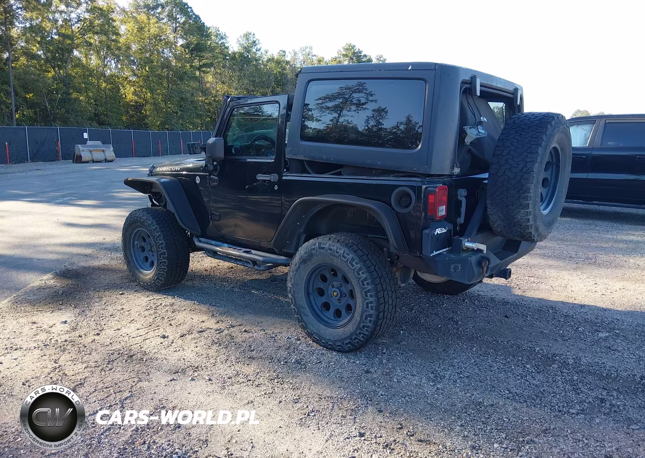 2013 Jeep Wrangler Rubicon VIN:1C4HJWCG5DL517018 - 3