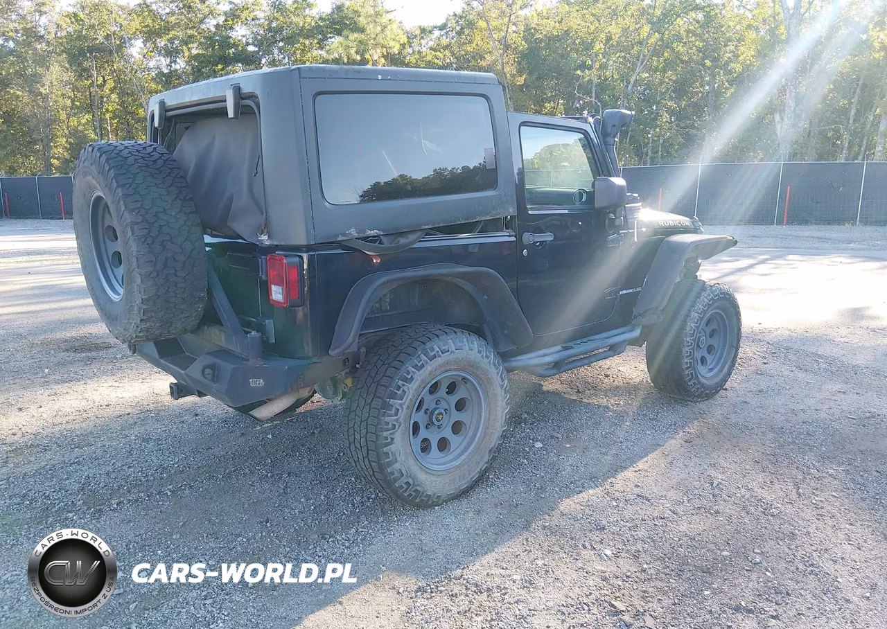 2013 Jeep Wrangler Rubicon VIN:1C4HJWCG5DL517018 - 4