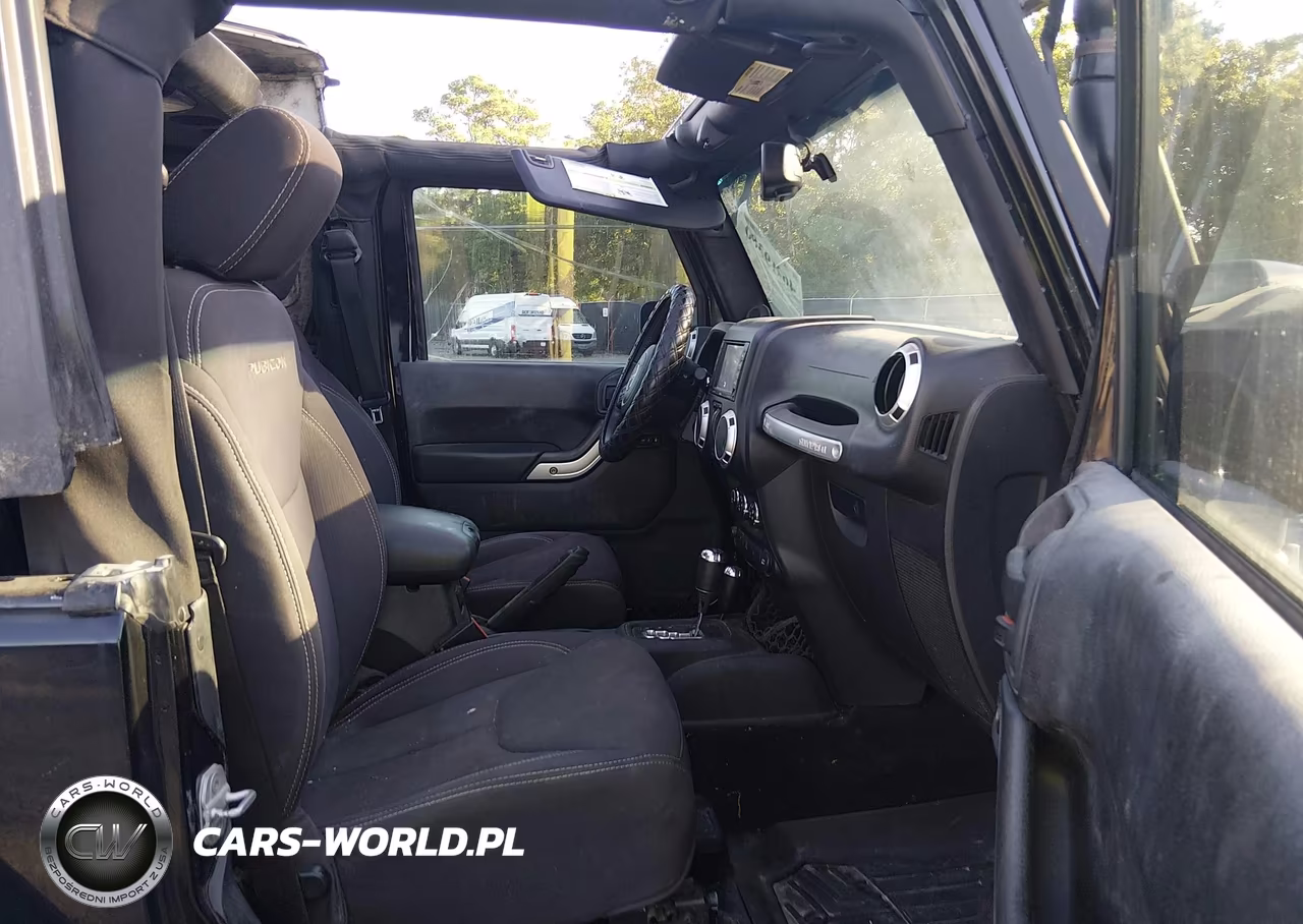 2013 Jeep Wrangler Rubicon VIN:1C4HJWCG5DL517018 - 5