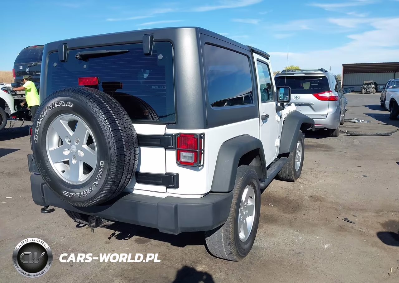 2012 Jeep Wrangler Sport VIN:1C4AJWAGXCL184608 - 4