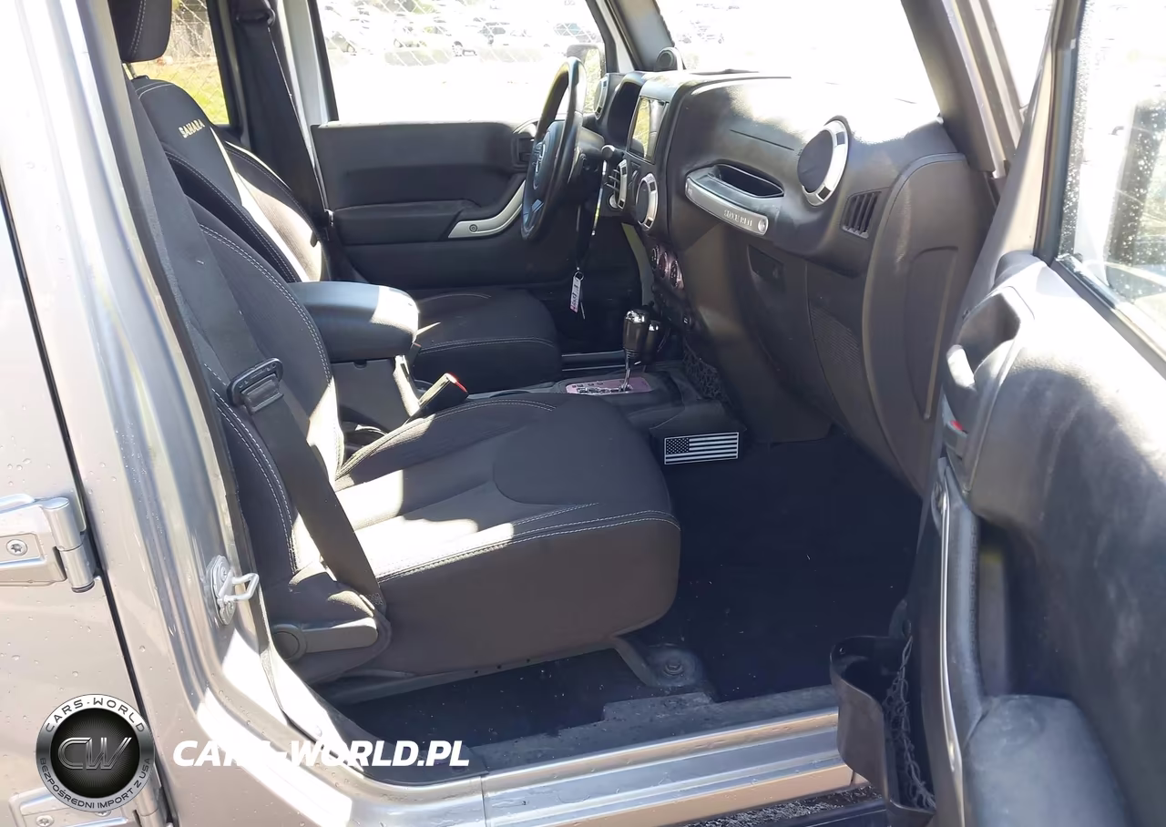 2014 Jeep Wrangler Unlimited Sahara VIN:1C4BJWEG3EL243399 - 5