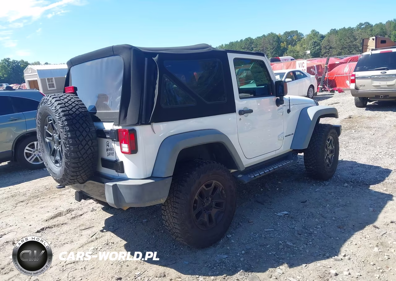 2014 Jeep Wrangler Willys Wheeler VIN:1C4AJWAG5EL326060 - 4
