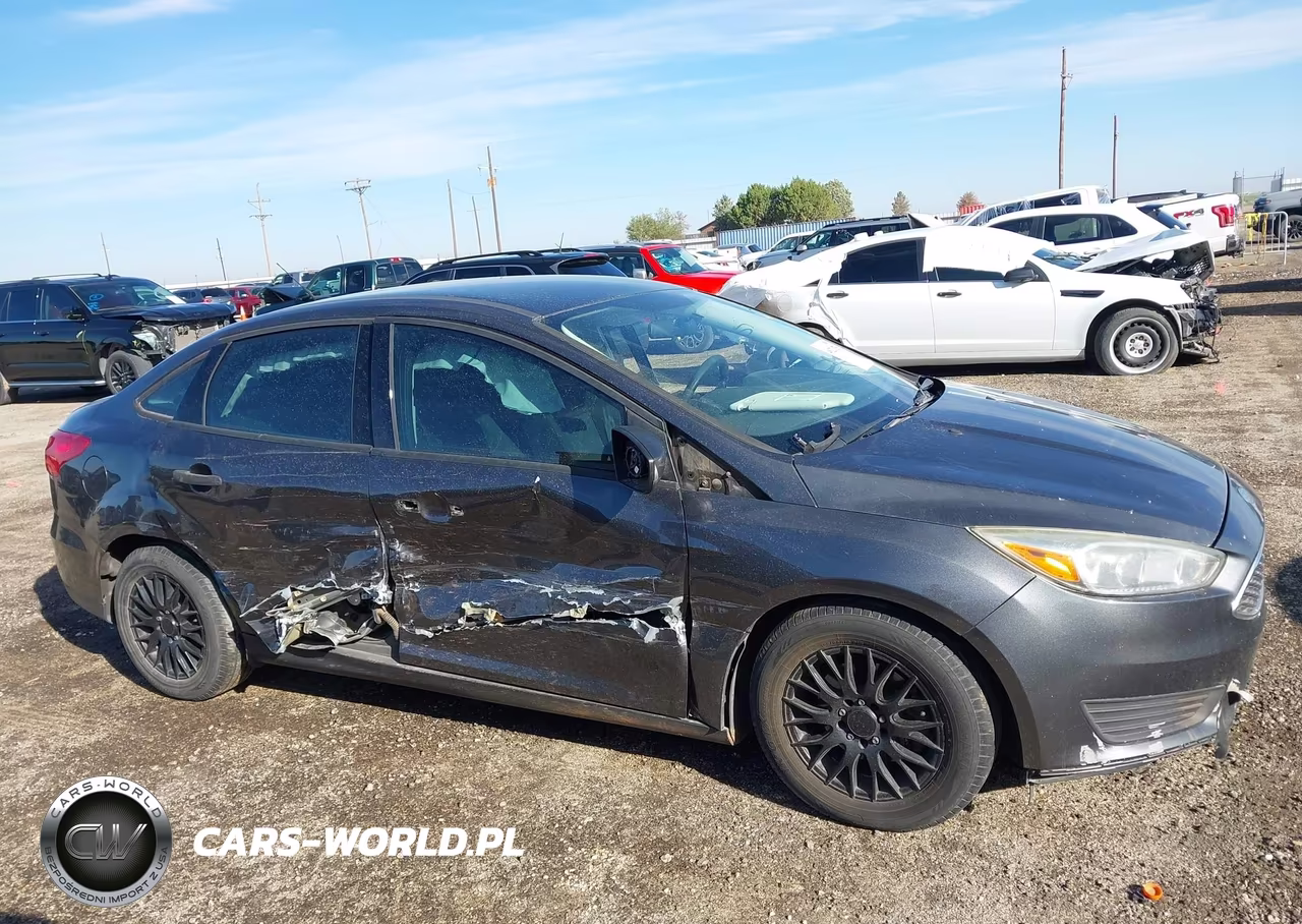 2017 Ford Focus S VIN:1FADP3E22HL295384 - 14