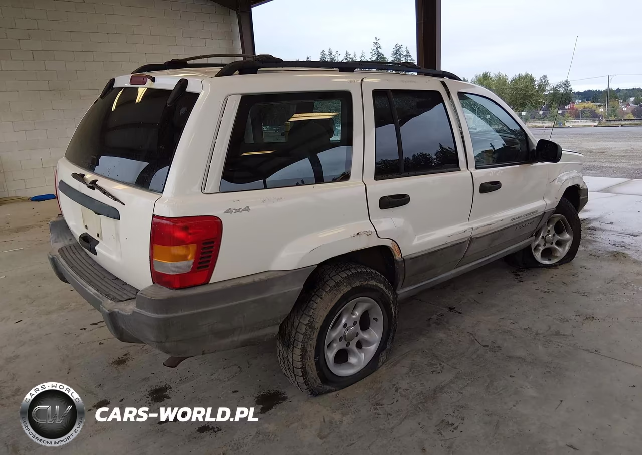 1999 Jeep Grand Cherokee Laredo VIN:1J4GW58S7XC501390 - 4