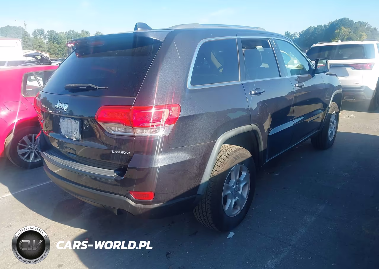 2015 Jeep Grand Cherokee Laredo VIN:1C4RJEAG2FC231194 - 4