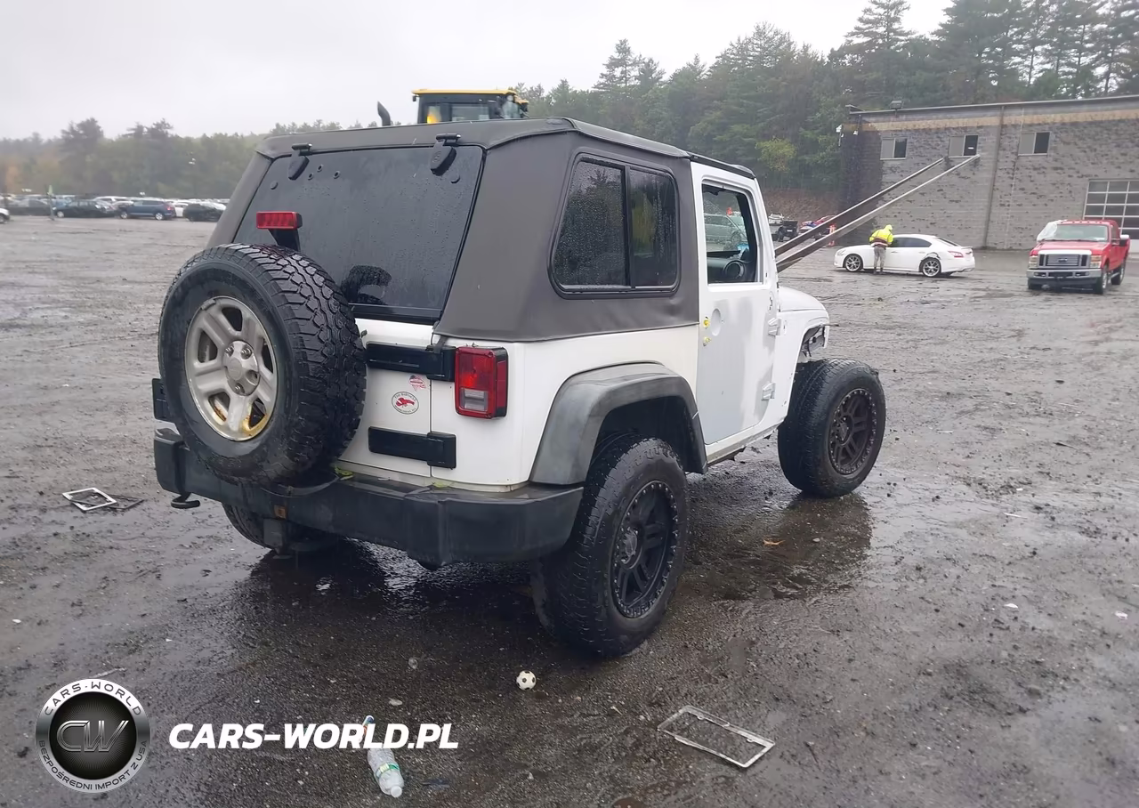 2012 Jeep Wrangler Sport VIN:1C4AJWAG3CL123598 - 4