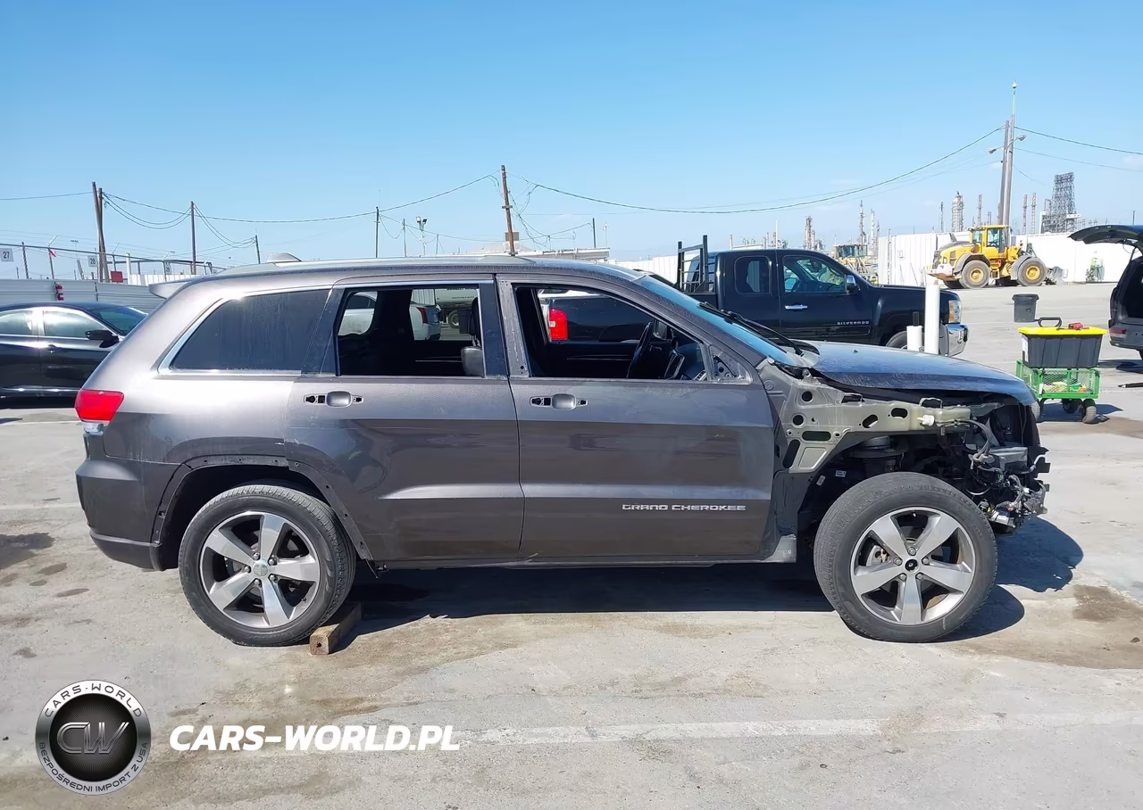 2015 Jeep Grand Cherokee Overland VIN:1C4RJFCG9FC833559 - 14