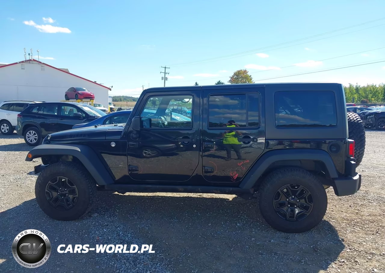 2016 Jeep Wrangler Unlimited Willys Wheeler VIN:1C4BJWDG8GL155369 - 14