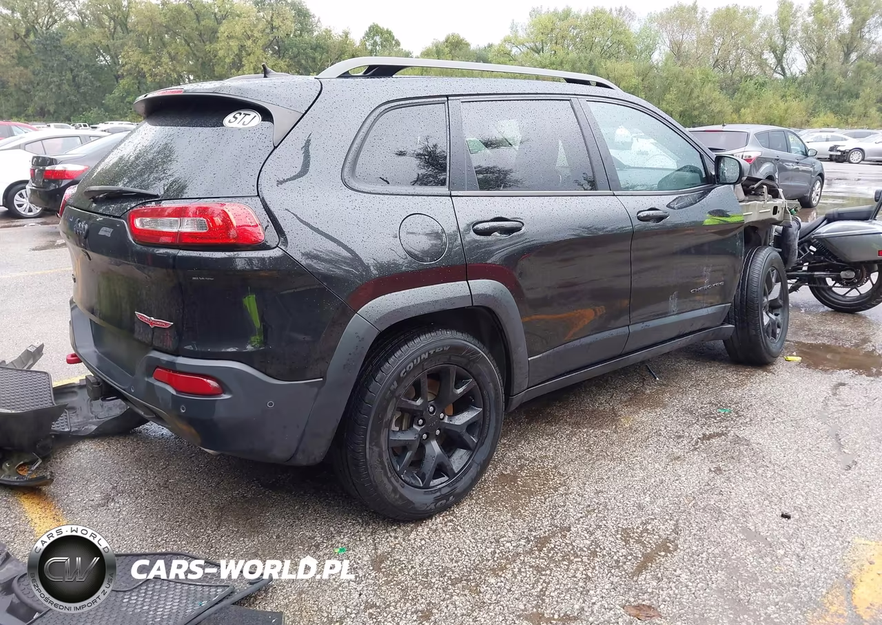 2015 Jeep Cherokee Trailhawk VIN:1C4PJMBS4FW591960 - 4