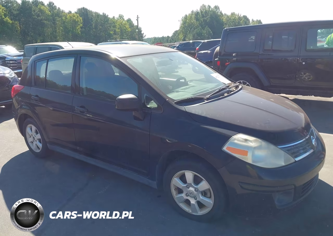 2009 Nissan Versa 1.8Sl VIN:3N1BC13E09L418817 - 1