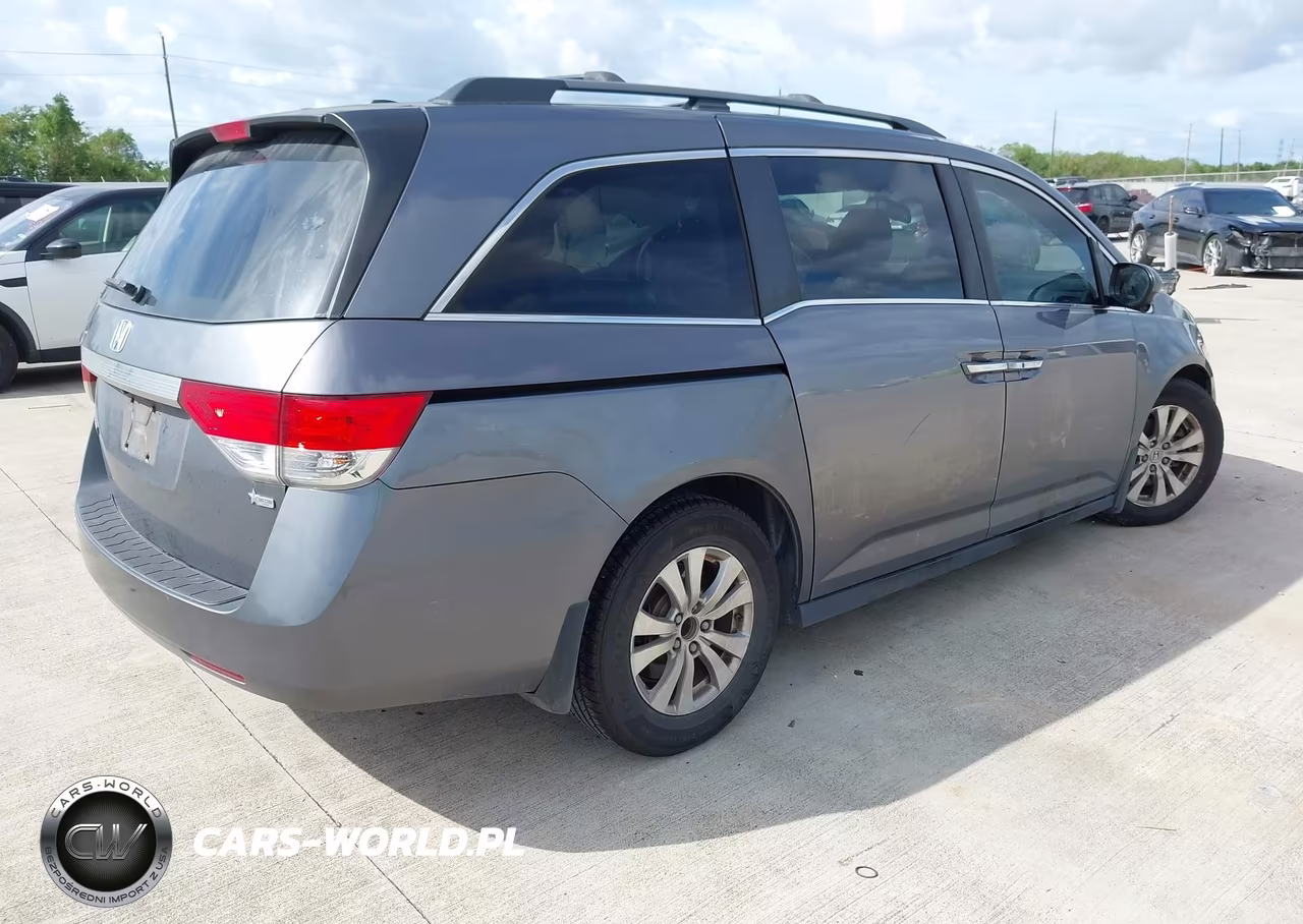 2014 Honda Odyssey Ex-L VIN:5FNRL5H64EB102527 - 4