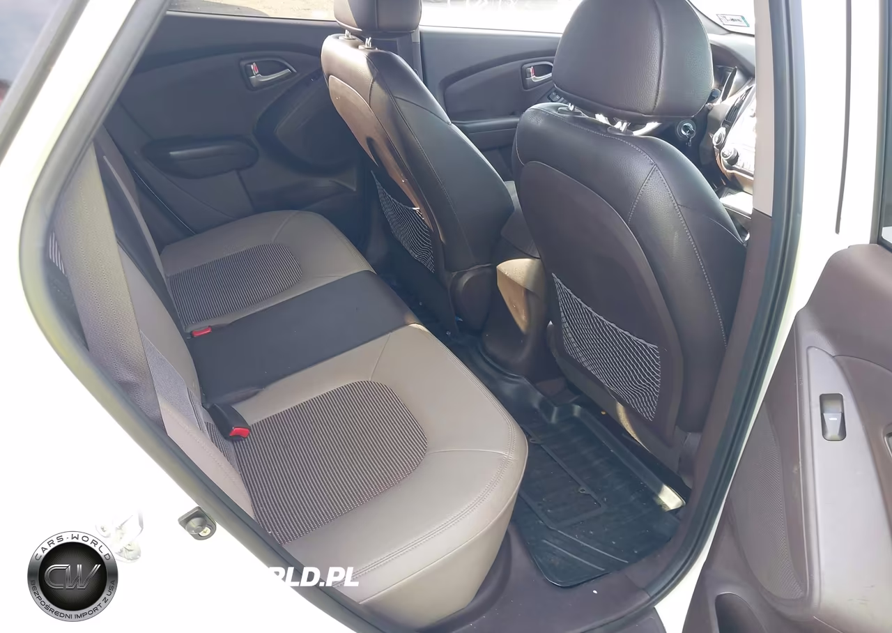 2012 Hyundai Tucson Gls VIN:KM8JUCAC1CU335473 - 8