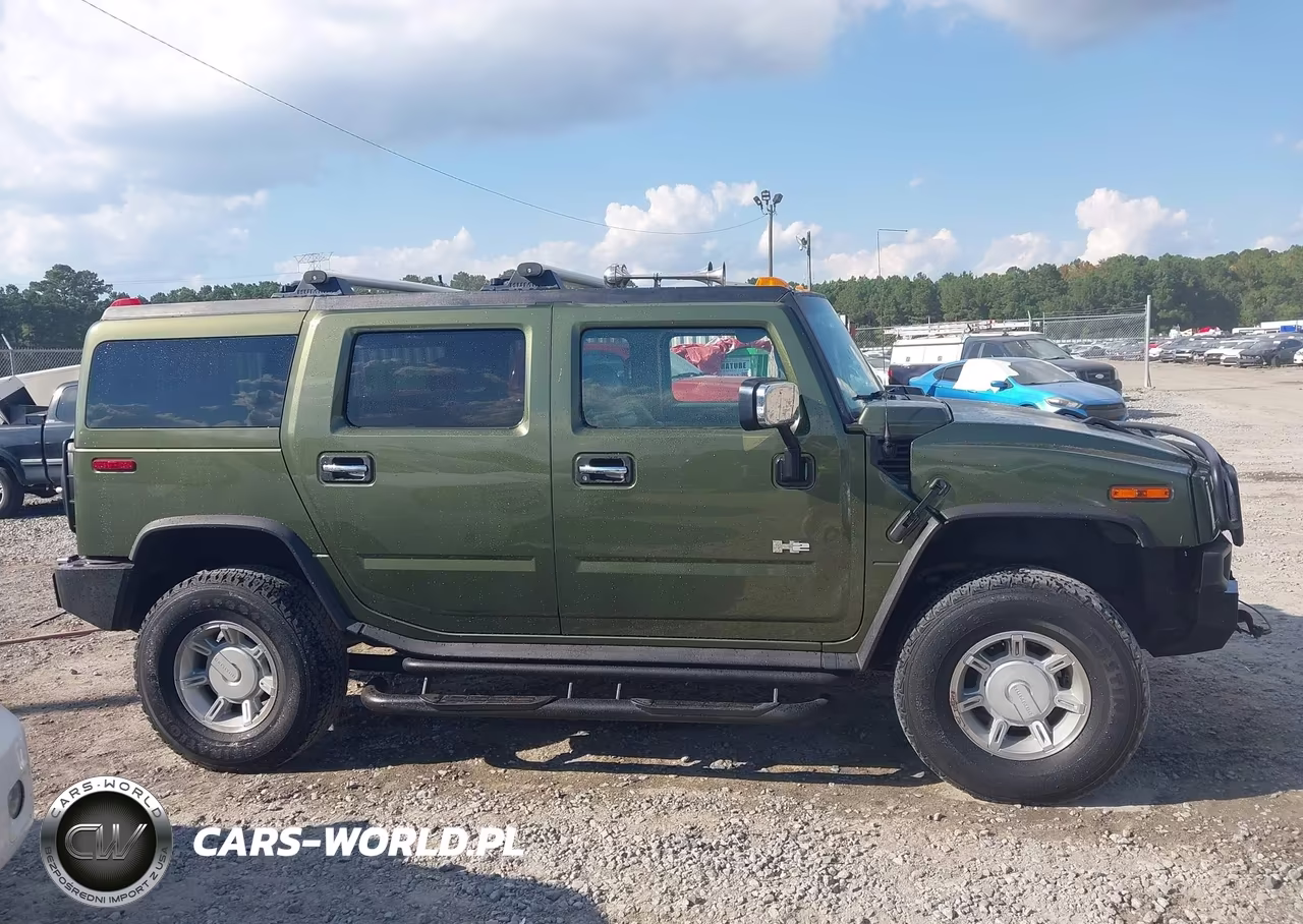 2004 Hummer H2 VIN:5GRGN23U24H110502 - 13