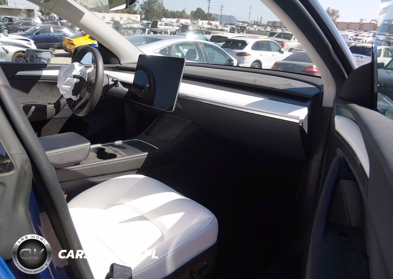 2023 Tesla Model Y Performance Dual Motor All-Wheel Drive VIN:7SAYGDEF0PF959254 - 5