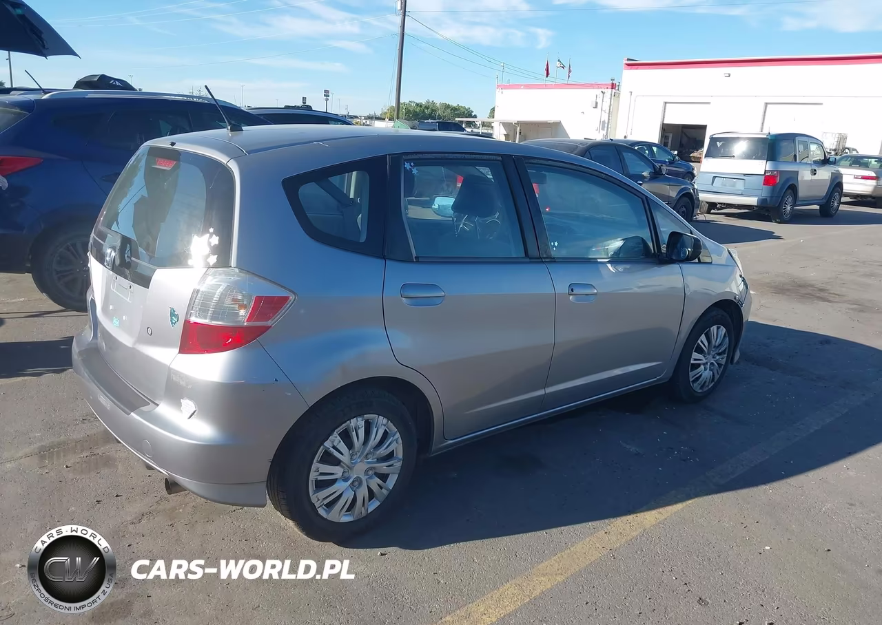 2009 Honda Fit VIN:JHMGE88239S056972 - 4