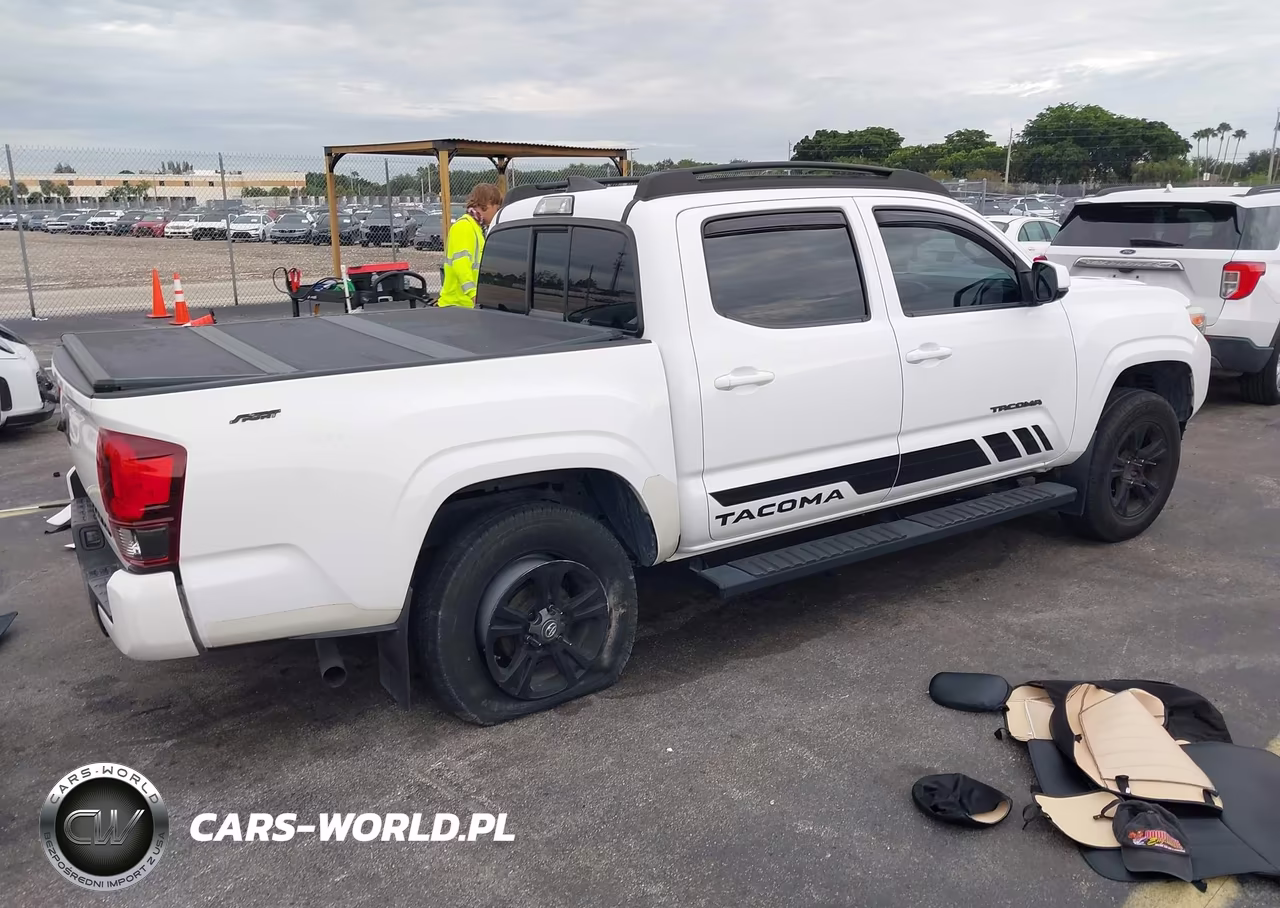 2018 Toyota Tacoma Sr VIN:5TFAX5GN6JX119839 - 4