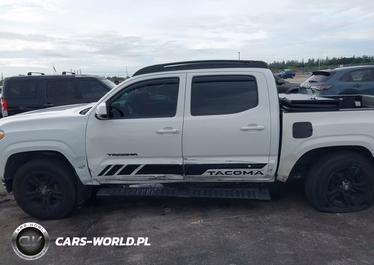 2018 Toyota Tacoma Sr VIN:5TFAX5GN6JX119839 - 6