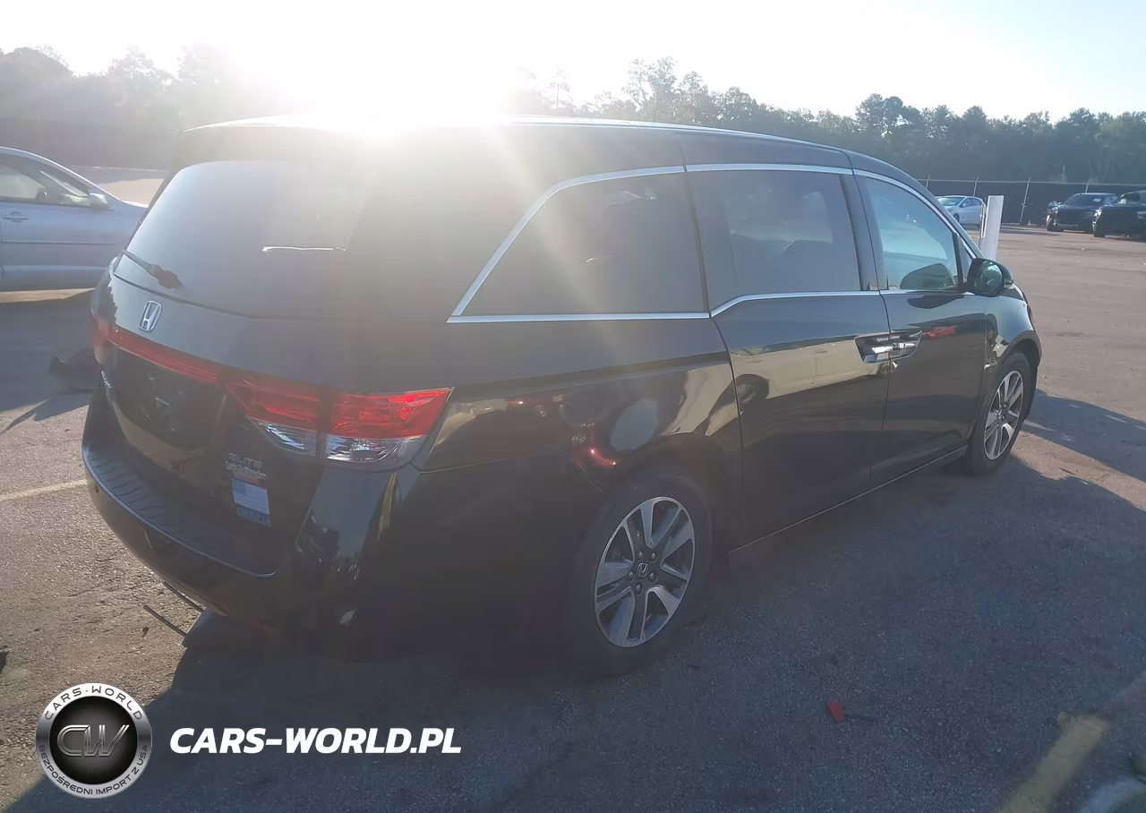 2014 Honda Odyssey Touring-Touring Elite VIN:5FNRL5H98EB006779 - 4