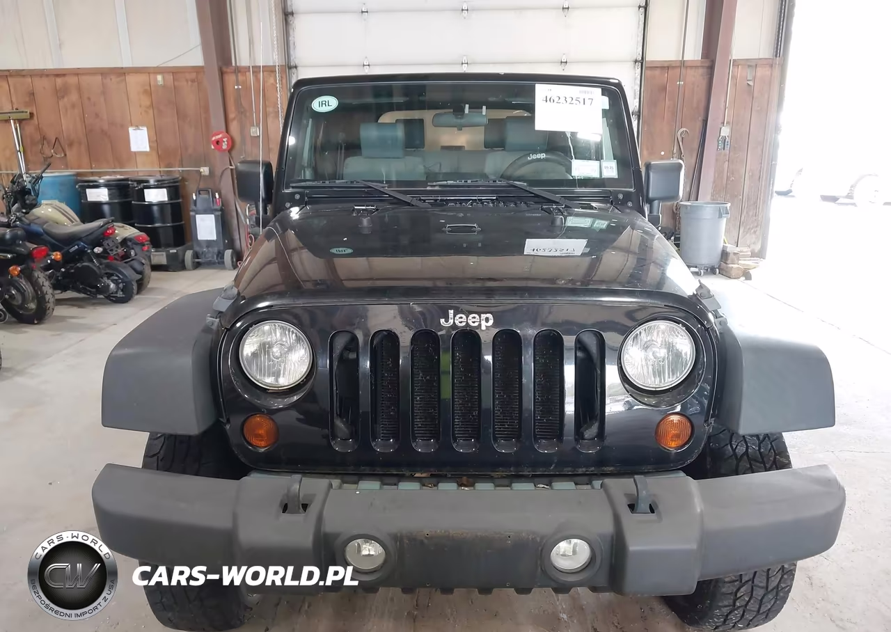 2010 Jeep Wrangler Sport VIN:1J4GA2D17AL103890 - 12