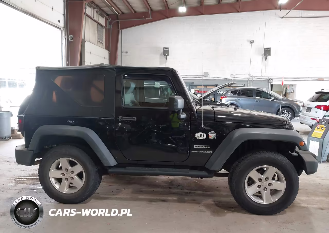 2010 Jeep Wrangler Sport VIN:1J4GA2D17AL103890 - 13