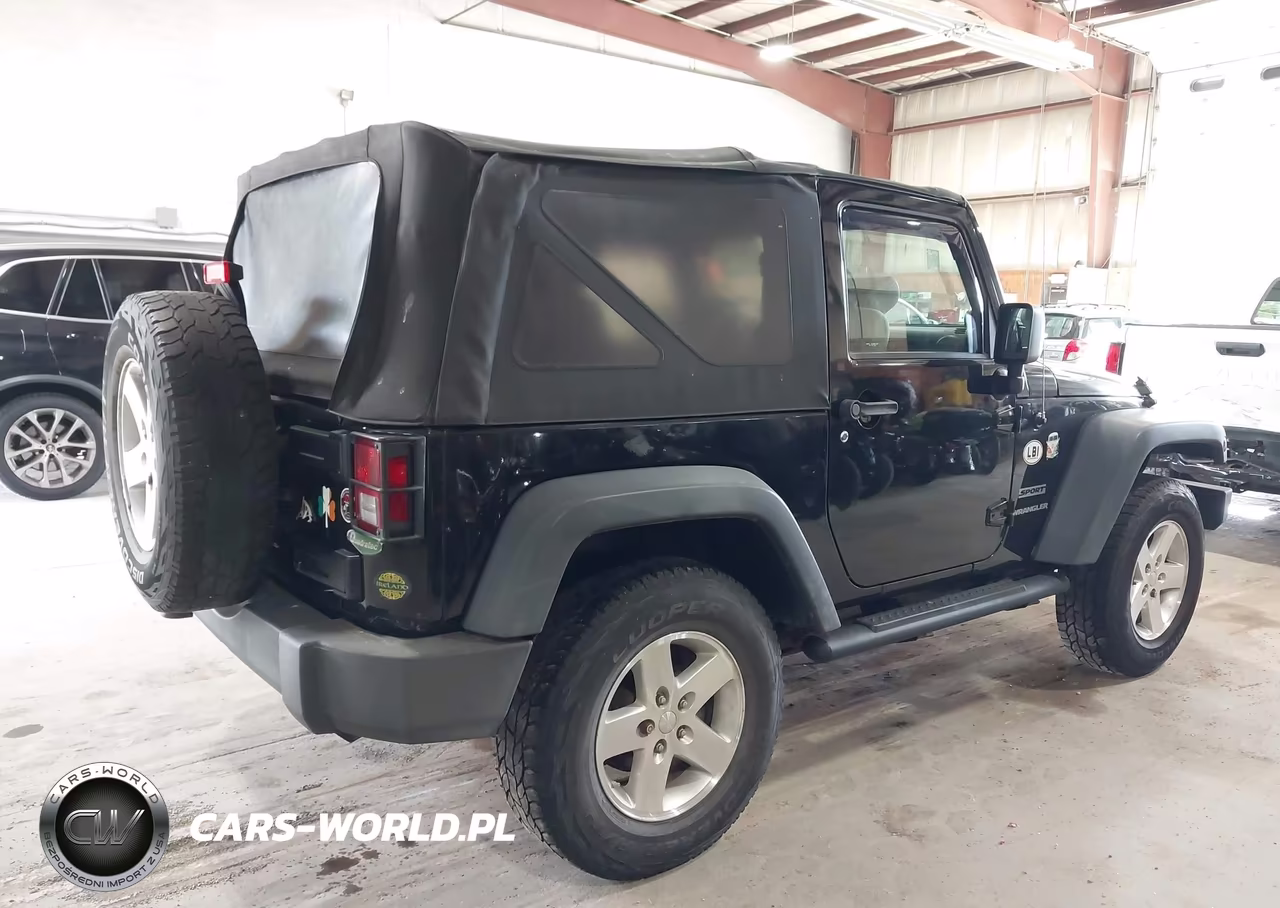 2010 Jeep Wrangler Sport VIN:1J4GA2D17AL103890 - 4