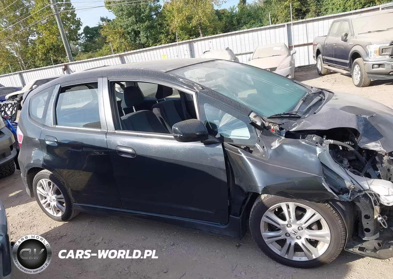 2009 Honda Fit Sport VIN:JHMGE88469C000682 - 14