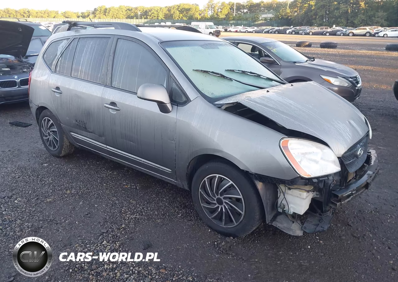 2009 Kia Rondo Lx VIN:KNAFG529997262566 - 1
