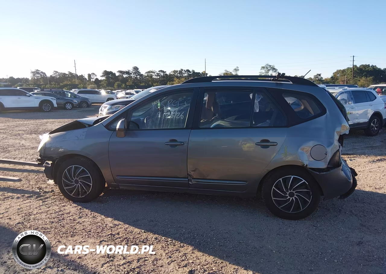 2009 Kia Rondo Lx VIN:KNAFG529997262566 - 14