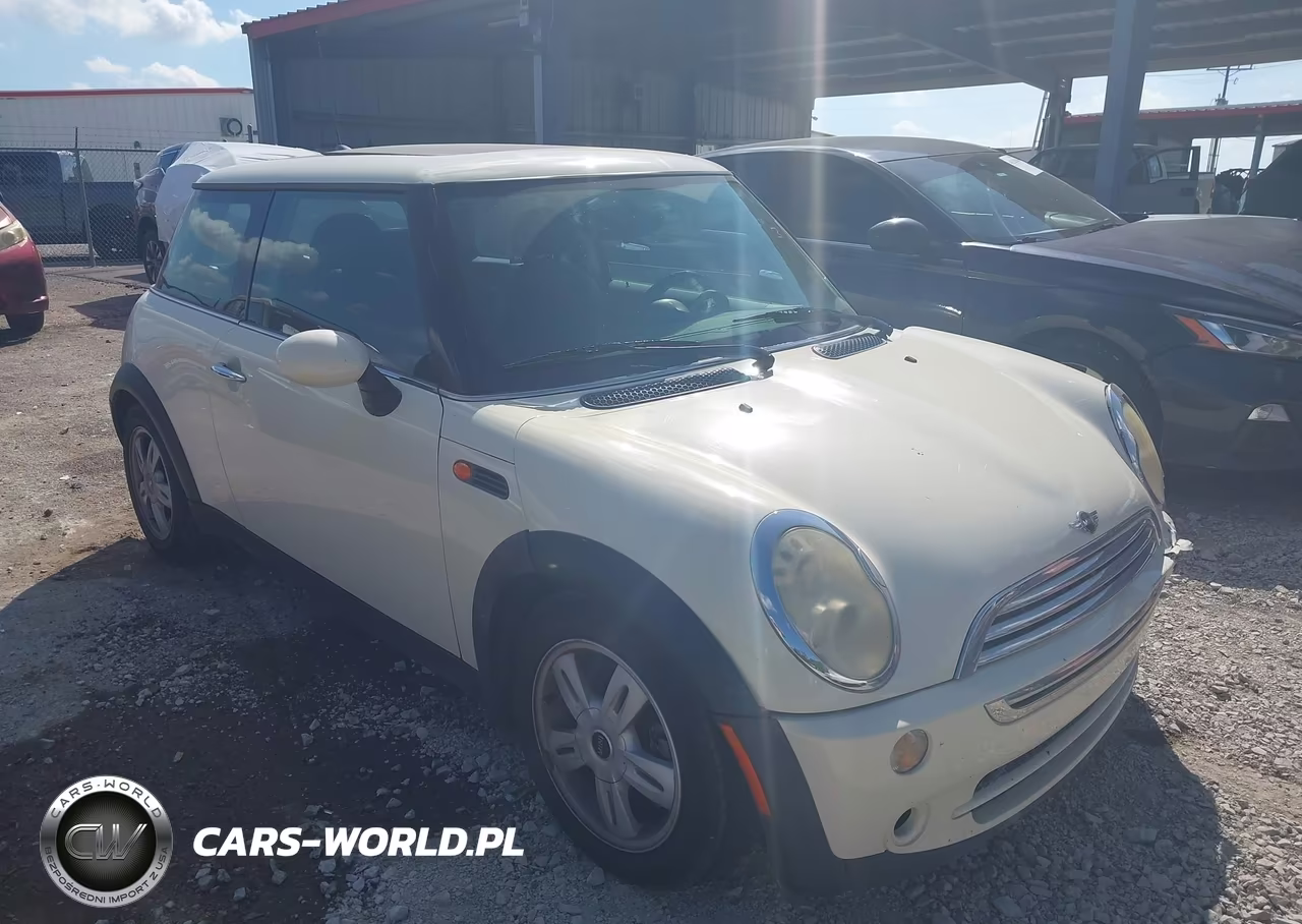 2006 Mini Cooper VIN:WMWRC33586TK18912 - 1