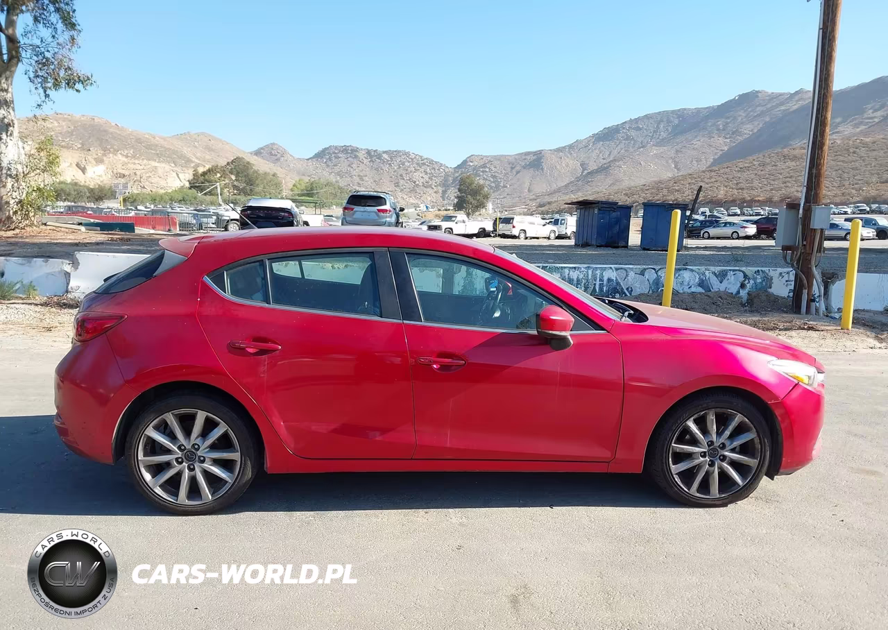 2017 Mazda Mazda3 Touring VIN:3MZBN1L75HM150233 - 13