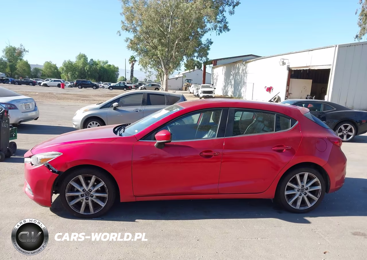 2017 Mazda Mazda3 Touring VIN:3MZBN1L75HM150233 - 14