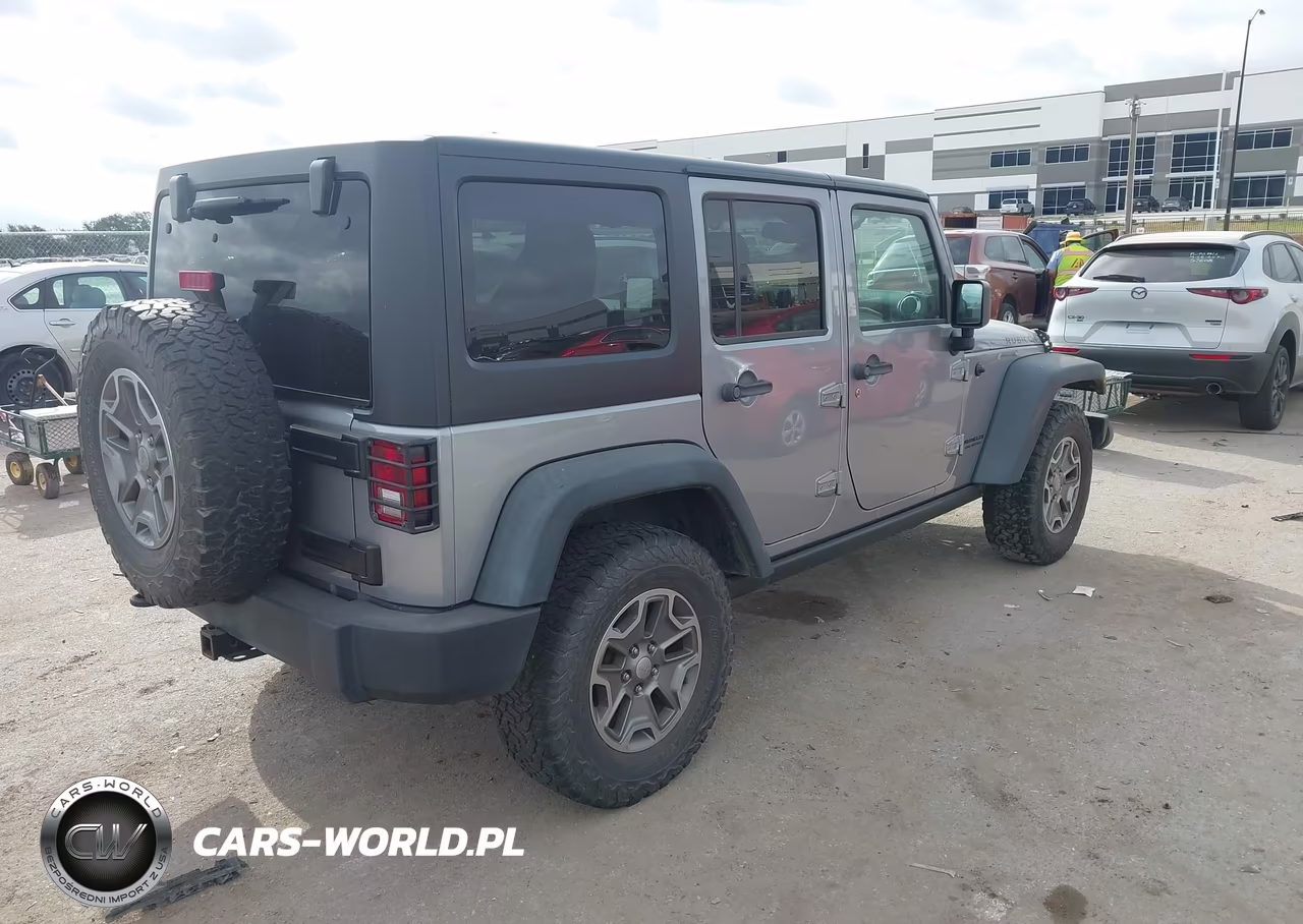 2015 Jeep Wrangler Unlimited Rubicon VIN:1C4BJWFG0FL515195 - 4