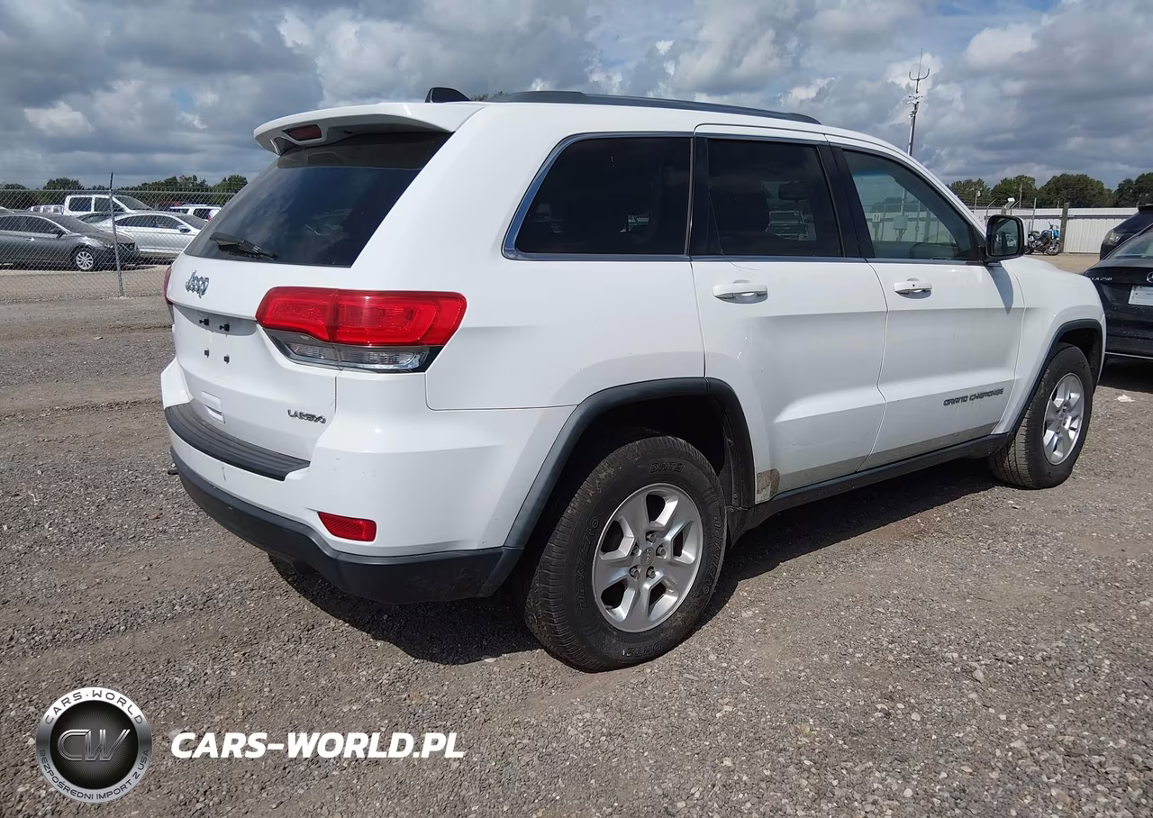 2014 Jeep Grand Cherokee Laredo VIN:1C4RJEAG4EC243281 - 4