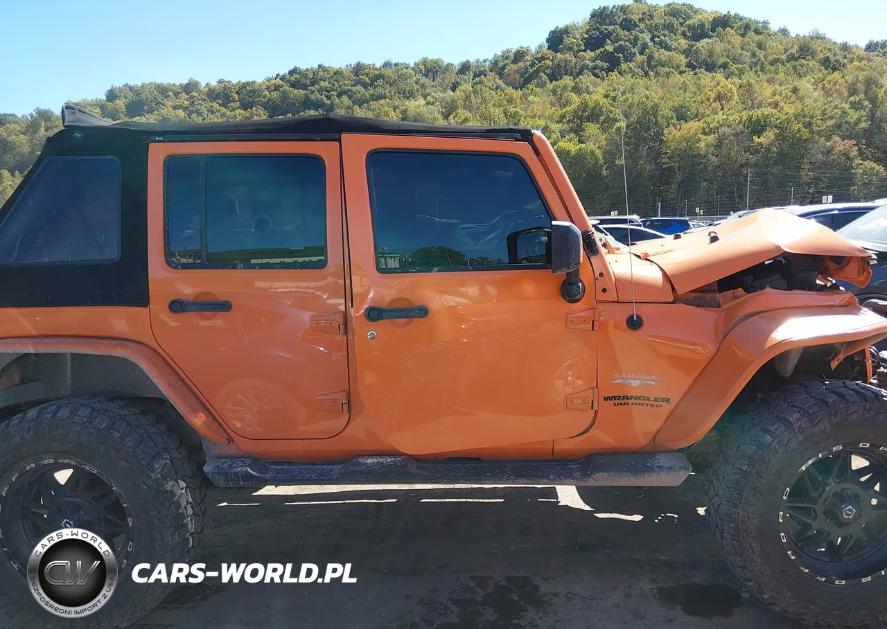 2012 Jeep Wrangler Unlimited Sahara VIN:1C4HJWEG7CL213605 - 13