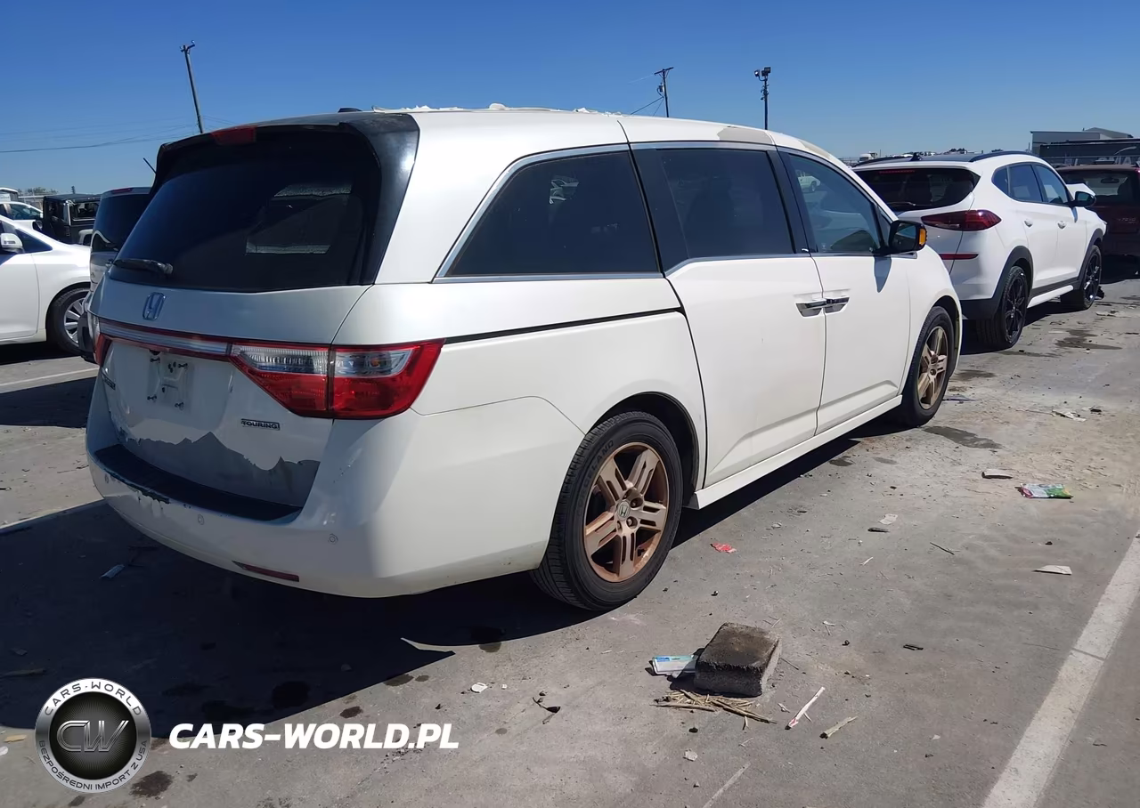 2012 Honda Odyssey Touring-Touring Elite VIN:5FNRL5H97CB057929 - 4