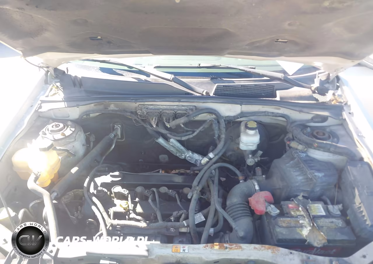 2009 Mercury Mariner I4 VIN:4M2CU81769KJ04676 - 10