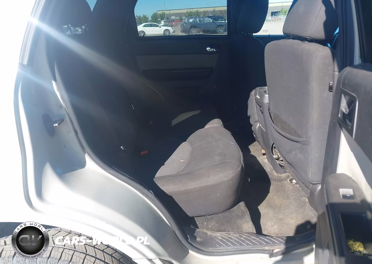 2009 Mercury Mariner I4 VIN:4M2CU81769KJ04676 - 8