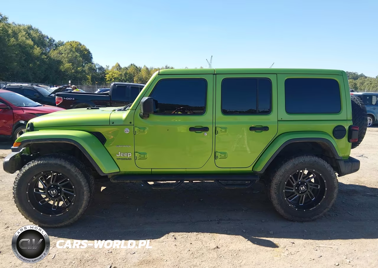 2019 Jeep Wrangler Unlimited Sahara 4X4 VIN:1C4HJXEN2KW524201 - 14