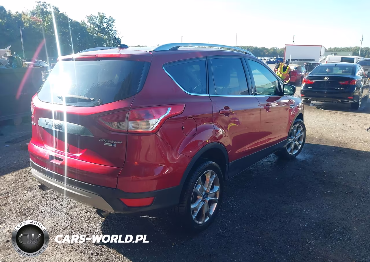 2016 Ford Escape Titanium VIN:1FMCU9J98GUC91820 - 4
