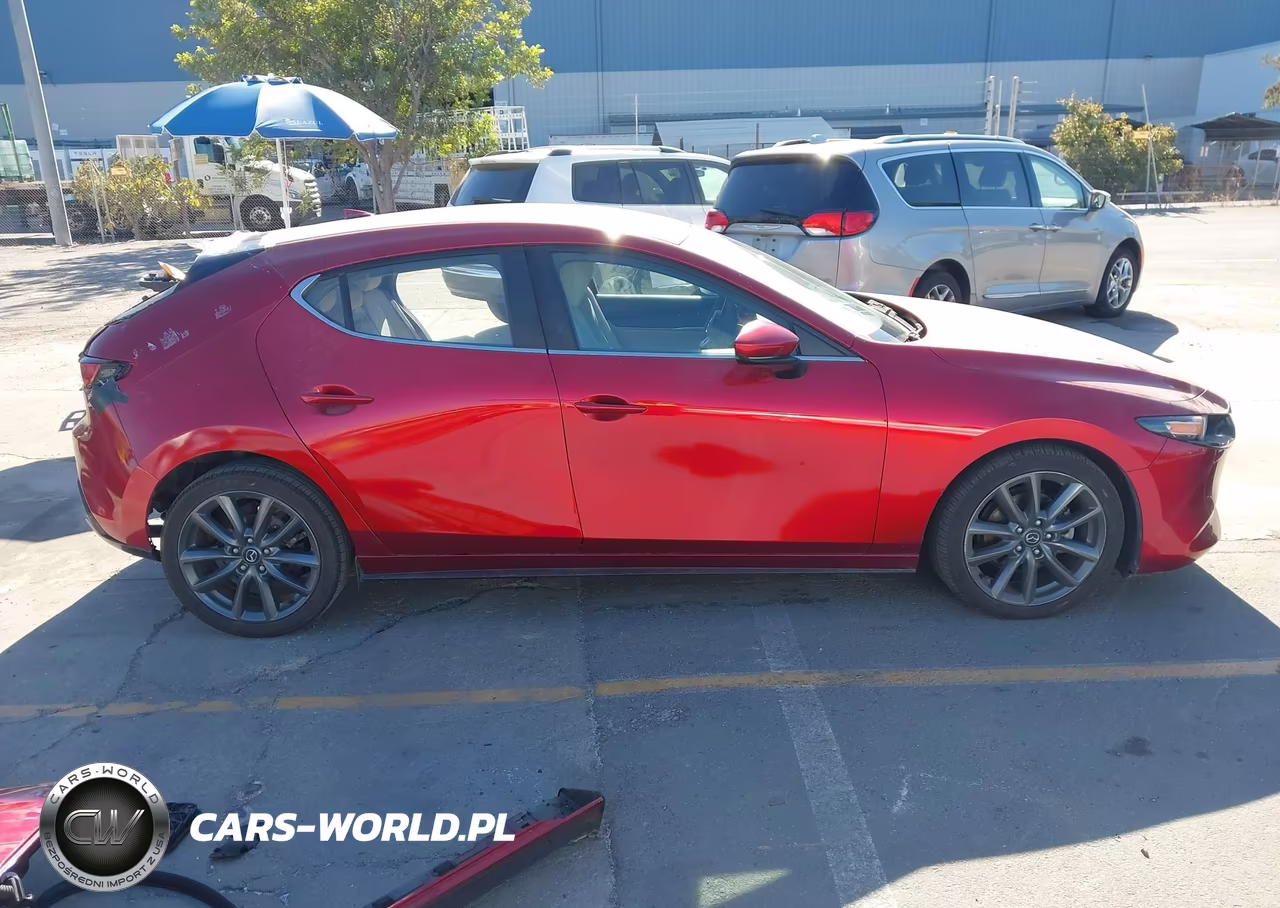2019 Mazda 3 Preferred VIN:JM1BPBMM2K1124622 - 14