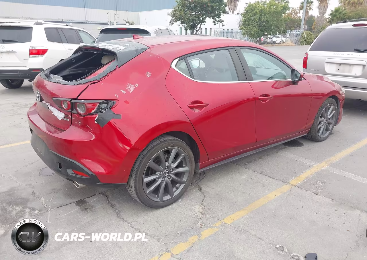 2019 Mazda 3 Preferred VIN:JM1BPBMM2K1124622 - 4