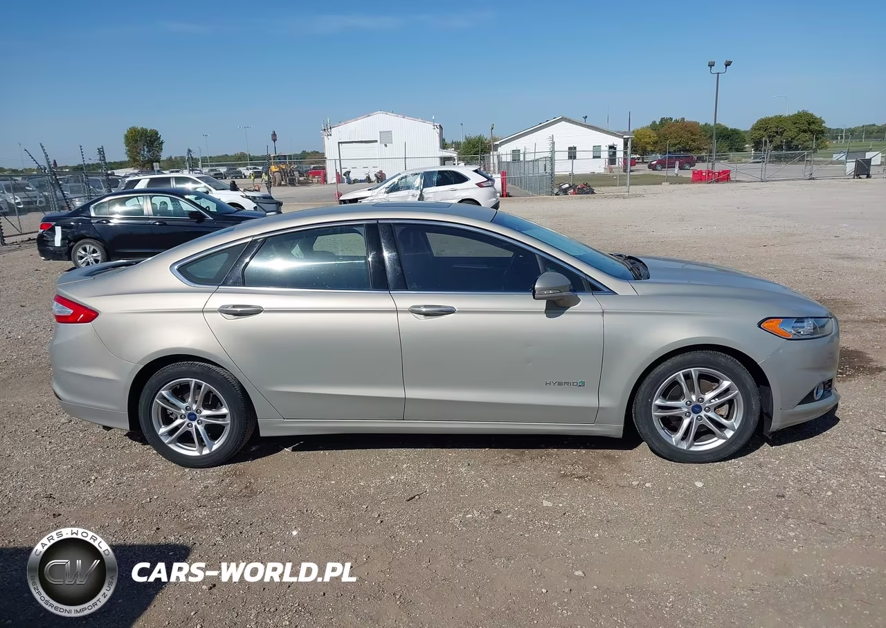 2016 Ford Fusion Hybrid Titanium VIN:3FA6P0RUXGR127205 - 13