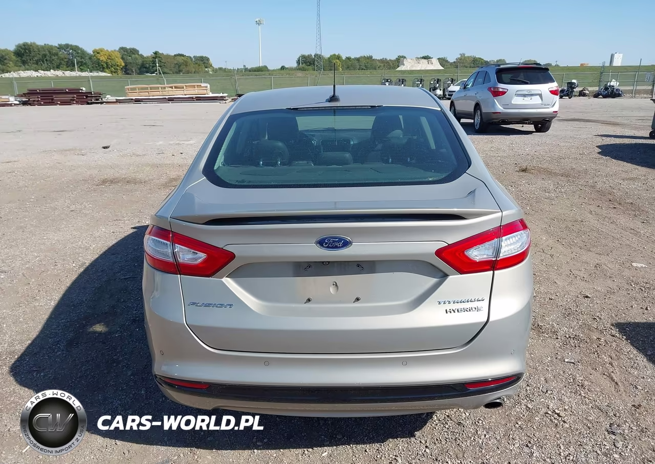 2016 Ford Fusion Hybrid Titanium VIN:3FA6P0RUXGR127205 - 16