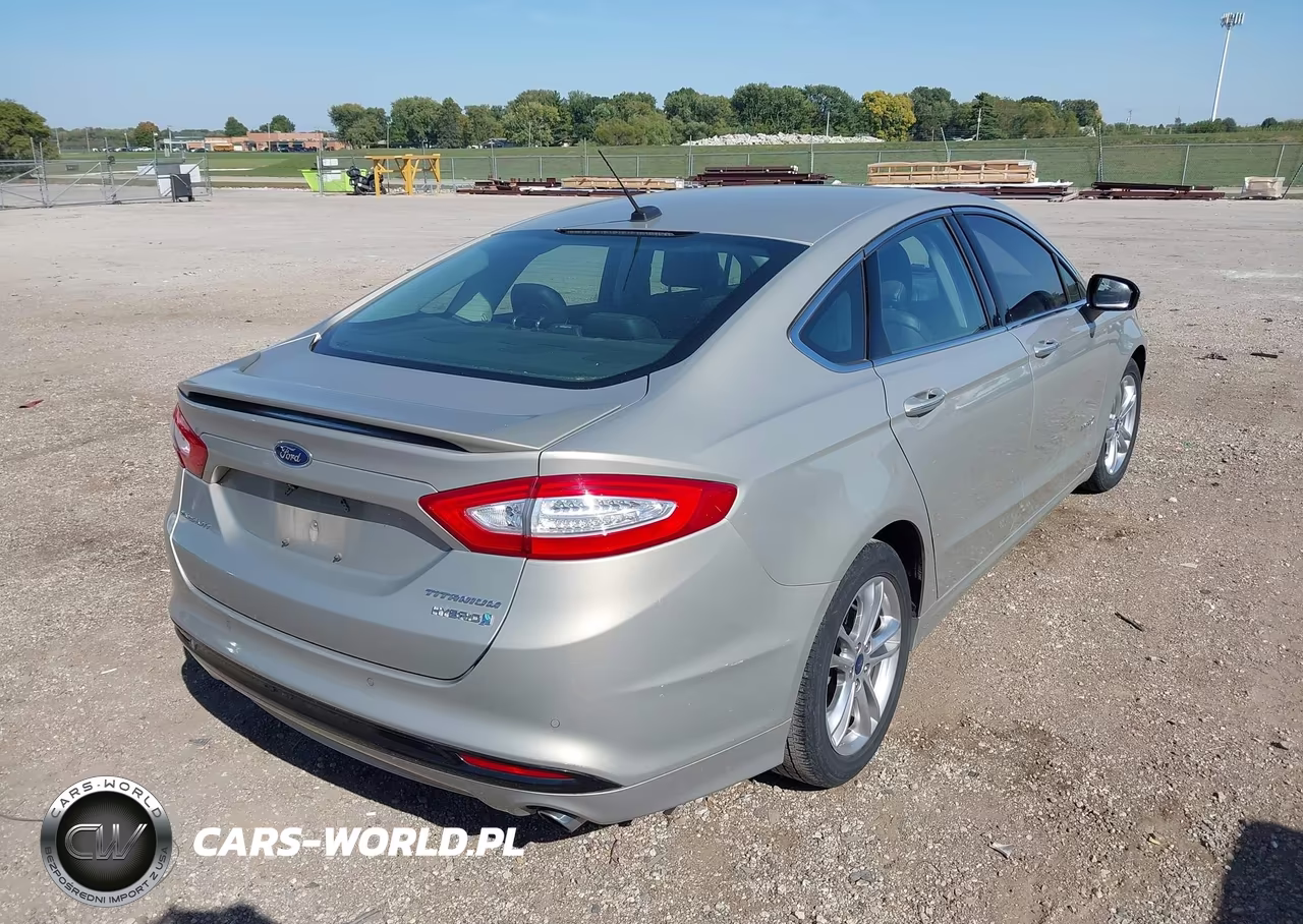 2016 Ford Fusion Hybrid Titanium VIN:3FA6P0RUXGR127205 - 4