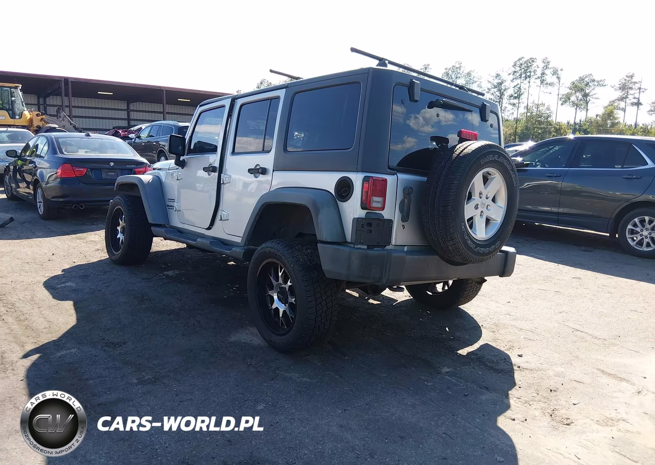 2011 Jeep Wrangler Unlimited Sport VIN:1J4BA3H10BL596923 - 3