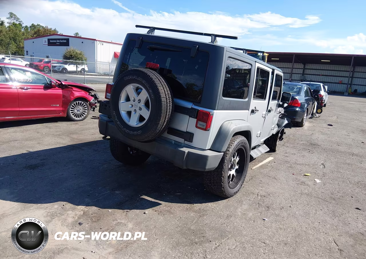 2011 Jeep Wrangler Unlimited Sport VIN:1J4BA3H10BL596923 - 4